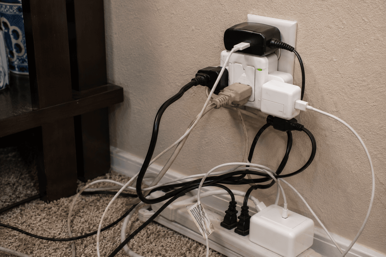 Overloaded electrical outlets creating a fire hazard