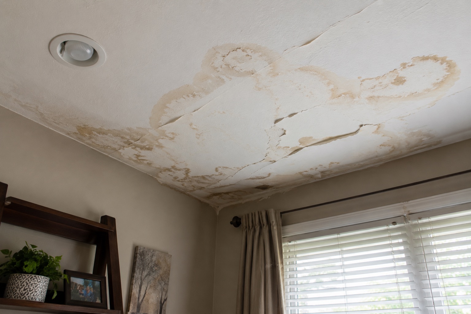 Ceiling leak creating a water and fall hazard