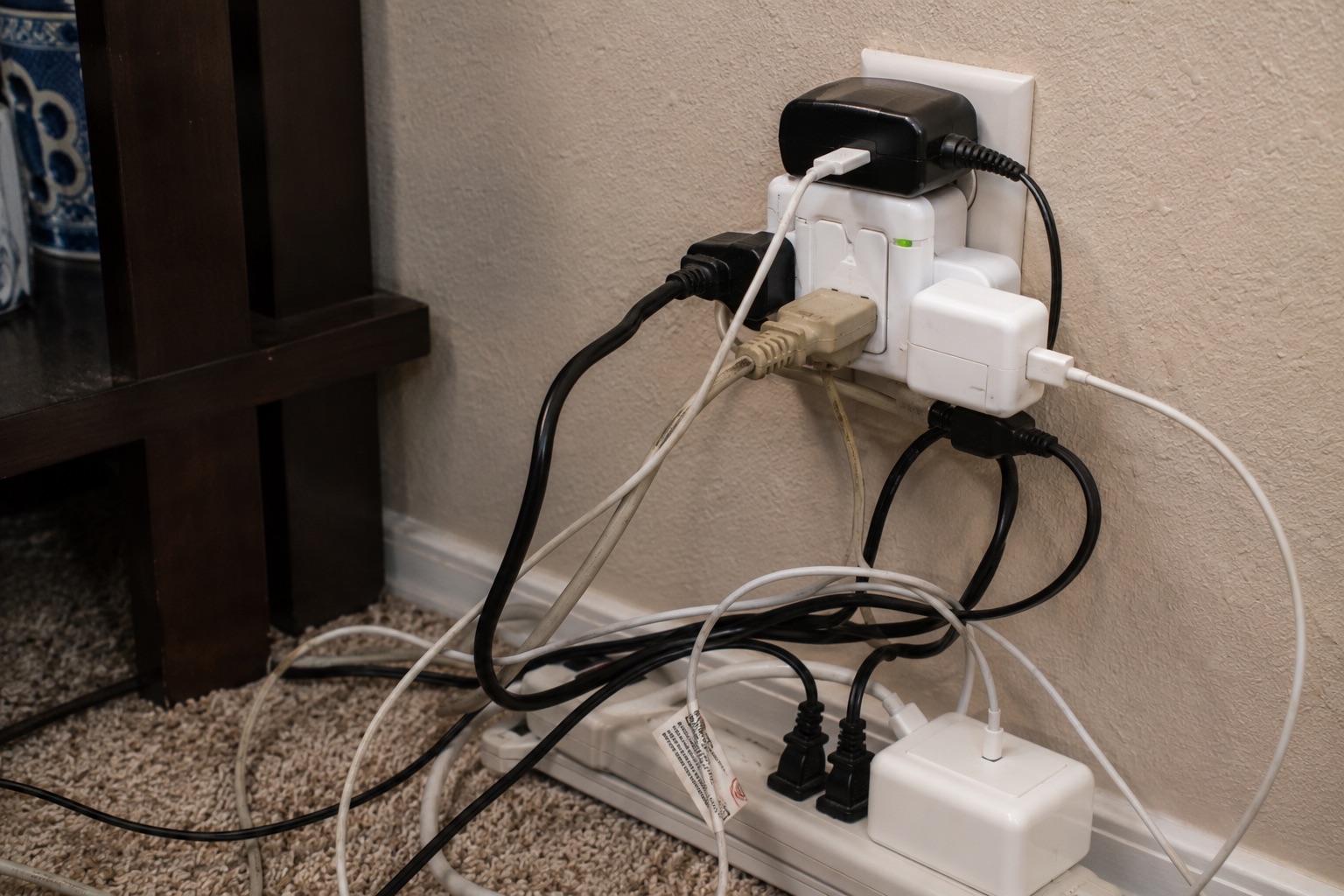 Overloaded electrical outlets creating a fire hazard