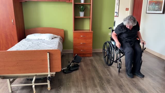 Wheelchair to bed: leg rests obstacle 2