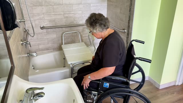 Wheelchair to tub: accurate