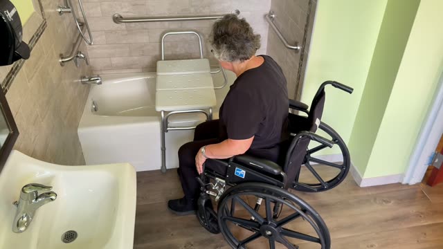 Wheelchair to tub: no brakes