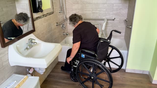 Wheelchair to tub: wheelchair too close
