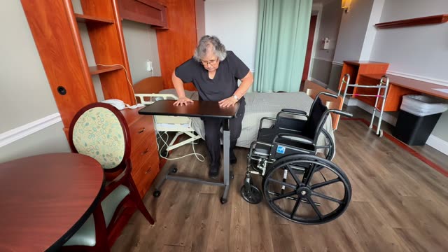 Bed to wheelchair: unsafe use of tray