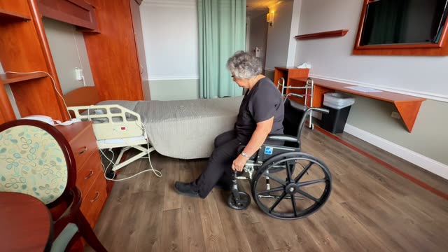 Wheelchair to bed: unsafe transfer