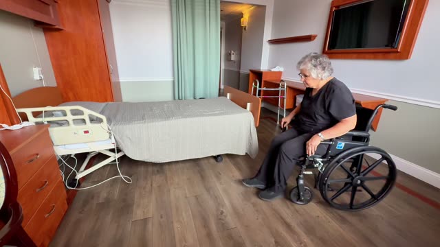 Wheelchair to bed: unlocked brakes